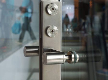 Glass fittings for frameless glass facades and walls.の写真素材