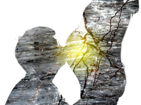 Double exposure of asian man kissing the belly of his lovely pregnant wife and marble stone isolated on white background.の写真素材