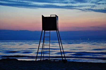 a lifeguard shack in the eveningの写真素材