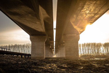Sunset under the bridge - Belgrade, Sertbia (Pupinov most)の写真素材