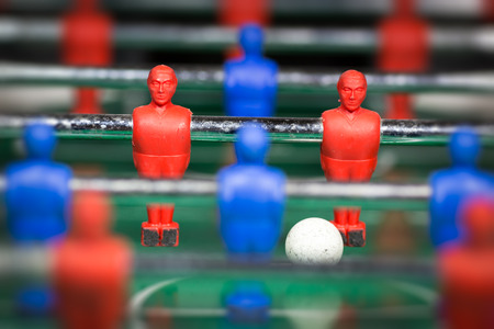 Table soccer player figurines with footballの写真素材
