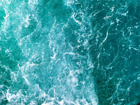 Background shot of aqua sea water surface. Blueの写真素材
