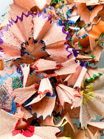 shavings and pieces of lead on paper after sharpening pencils, preparing pencils