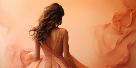 Ai generation. Young woman in long dress on peach background. Back view. Fashionの素材