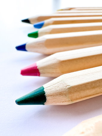 Wooden colorful ordinary pencils isolated on a white backgroundの写真素材