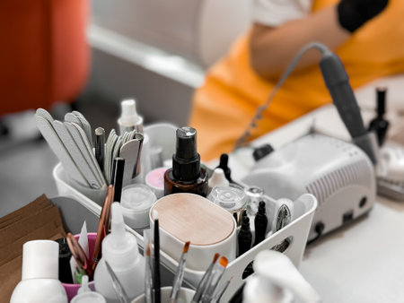 Professional manicure tools and equipment in a salon settingの写真素材
