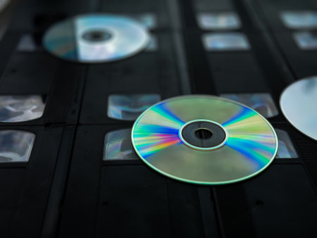 Transition from vhs tapes to dvds reflecting evolution in home entertainmentの写真素材