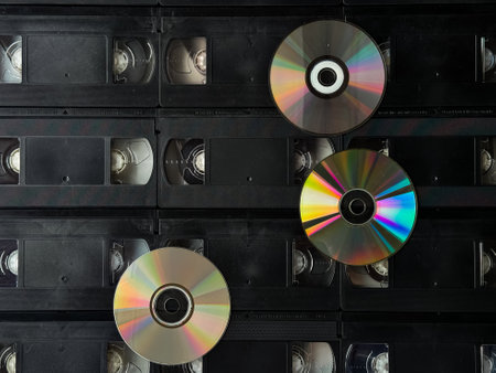 Retro media: vhs tapes and cds capturing nostalgic tech evolutionの写真素材