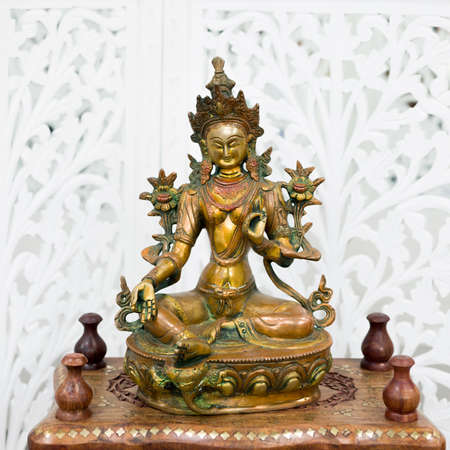 MOSCOW, RUSSIA - CIRCA OCTOBER, 2019: Ritual statuette of Goddess Green Tara. Bronze, decorated. Made in India, handmade, Delhi.bazaar, sale.のeditorial素材