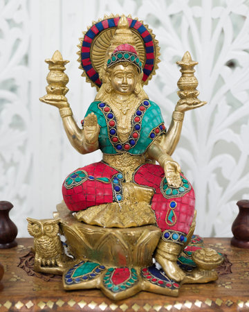 MOSCOW, RUSSIA - CIRCA OCTOBER, 2019: Ritual statuette of Goddess Lakshmi. Bronze, decorated. Made in India, handmade, Delhi.bazaar, sale.のeditorial素材