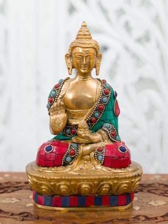 MOSCOW, RUSSIA - CIRCA OCTOBER, 2019: Ritual statuette of God Buddha Shakyamuni. Bronze, decorated. Made in India, handmade, Delhi.bazaar, sale.のeditorial素材