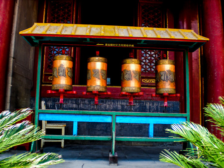 turning wheels at a buddhist templeのeditorial素材