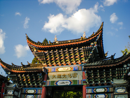 Chinese traditional temple entrance gate at sunsetのeditorial素材