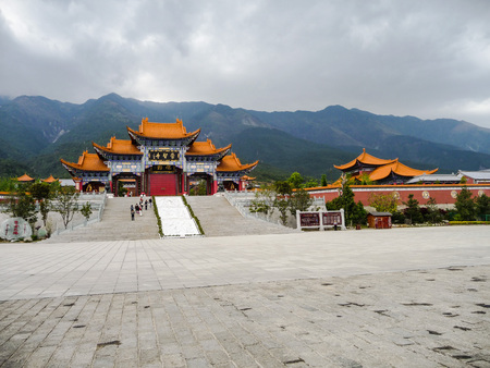 Chongsheng temple entrance gate with stormy weather, Dali, Chinaのeditorial素材