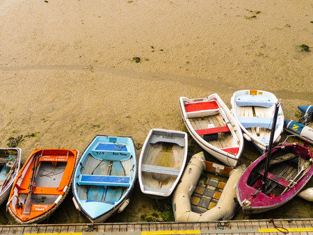 Small old fisher boat stranded on the sandのeditorial素材