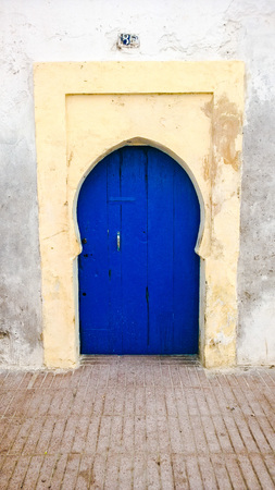 Simple traditional blue Moroccan door, Essaouria, Moroccoの写真素材