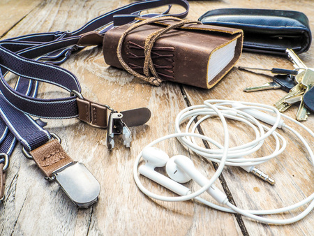 Hip male accessories on a wooden table