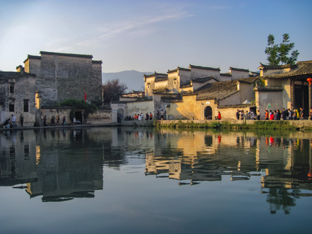 Houses in traditional Huizhou style next to the moon pound in Unesco listed Hongcun old village. Hongcun is located in Anhui near mountain Huangshan.のeditorial素材