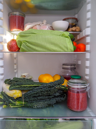 Open refrigerator of a zero waste and plastic free vegetarian lifestyle の写真素材