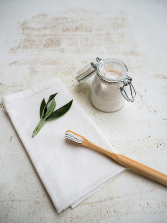DIY homemade vegan toothpaste in a small glass jar following a zero waste and plastic free lifestyleの写真素材