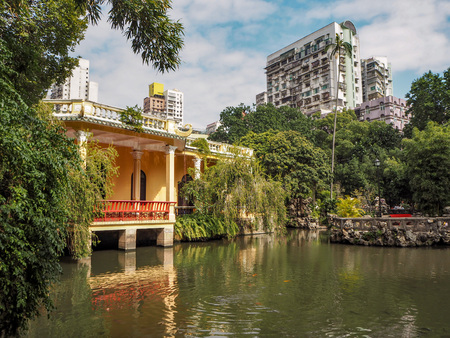 MACAU, CHINA - NOVEMBER 2018: The QIngcao hall in the middle of the Lou Lim Leoc public garden in the city center, overlooking the lotus pondのeditorial素材