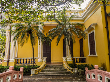 MACAU, CHINA - NOVEMBER 2018: The vibrant yellow Qingcao hall of the Lou Lim Leoc public garden and parkのeditorial素材