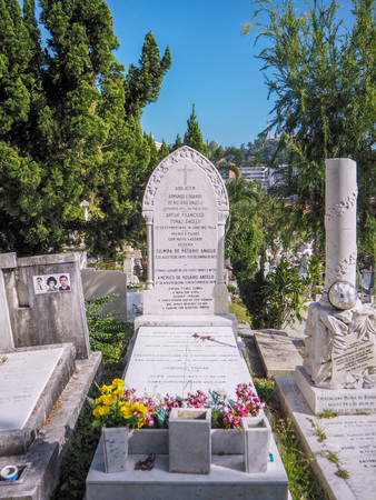 MACAU,CHINA - NOVEMBER 2018: The Saint Michael's chapel and cemetery in the city center with graves of catholic Macau Portuguese and Chineseのeditorial素材