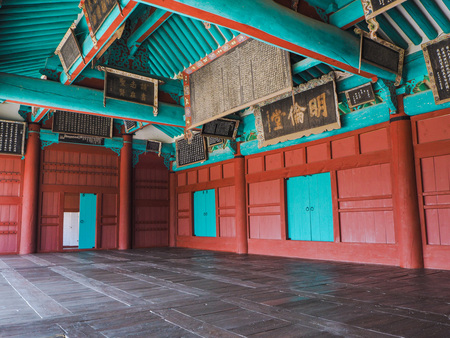 MARCH 2019 - SEOUL,KOREA: The colorful Myeongryundang lecture hall at the Seonggyungwan Munmyo temple, full with Chinese scripturesのeditorial素材