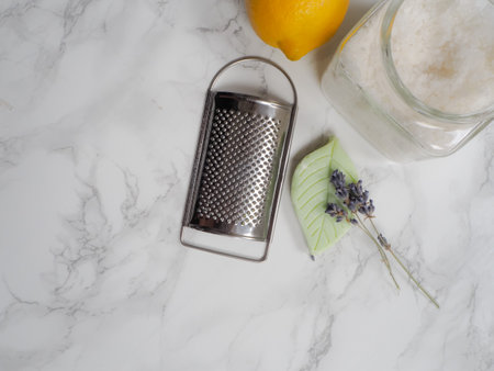 Ingredients for eco-friendly and plastic free homemade cleaning products and laundry detergent such as soda crystals, lemon, soap and lavender. Flat layの写真素材