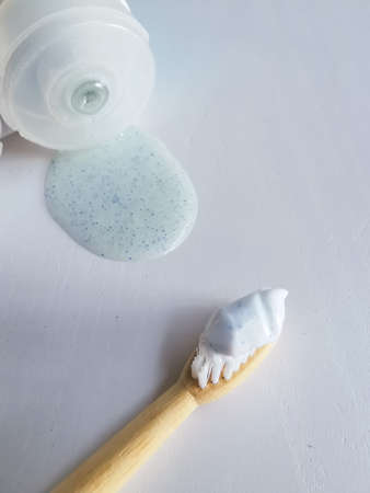 Micro plastic particles in personal care products such as toothpaste and face scrub on a white background. Representation of the micro plastic problems in daily products that damage nature.の写真素材