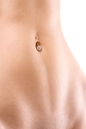 y stomach with piercing on a white backgroundの写真素材