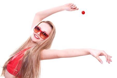woman in a red dress with the glasses on a white backgroundの写真素材