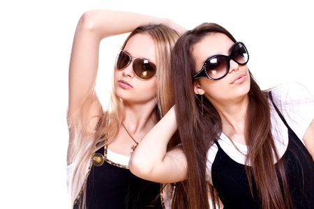 two beautiful women in a suit on a white background isolatedの写真素材