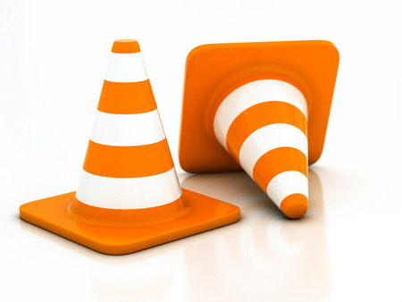 orange highway traffic cone on a white backgroundの写真素材