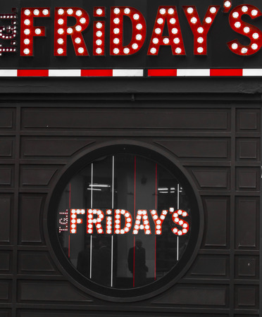 TGI Fridays restaurant at Piccadilly Circus in London. Editorial use only.