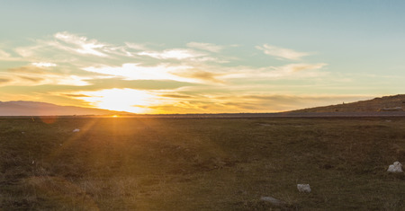 Panoramic dramatic sunset sky from the top of the Gran Sasso mountain in Abruzzo, Italyの写真素材