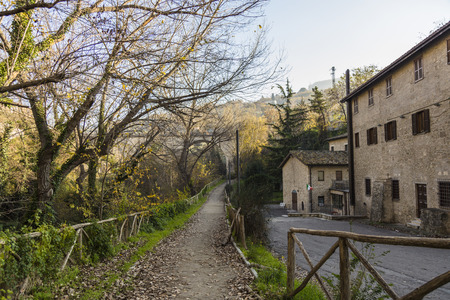 Street view between city and forest in Ascoli Piceno, Italyの写真素材