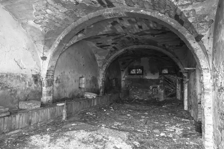 black and white interior view of an abandoned houseの写真素材