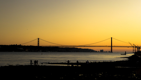 Amazing sunset at the Tago River in Lisbon