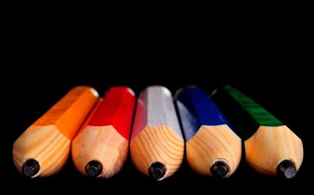  Color pencils on black background, close view の写真素材