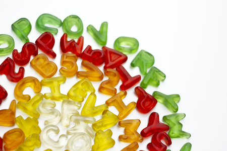 Gummy letters of latin alphabet on white backgroundの写真素材