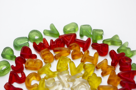 Gummy letters of latin alphabet on white backgroundの写真素材