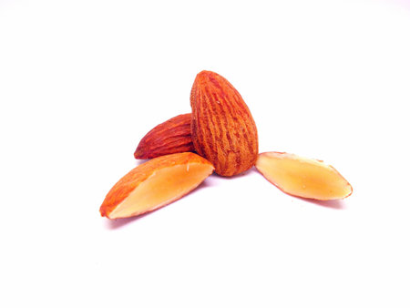 Almonds isolated on white backgroundの写真素材