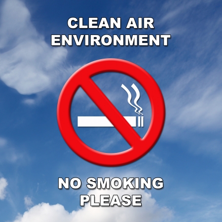 Clean air, no smoking sign in black and white text on a blue sky and cloud background.の写真素材