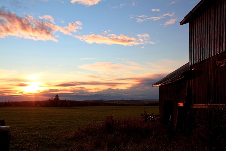 Beautiful sunset on a farm located in Quebec, Canada 