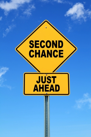 Yellow motivational road sign Second chance just aheadの写真素材