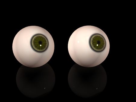 Two eyes over black background の写真素材