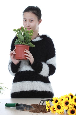 Active Chinese girl Gardeningの写真素材
