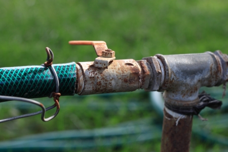 A water faucet in a park.の写真素材