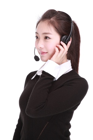 Businesswoman talking on headsetの写真素材